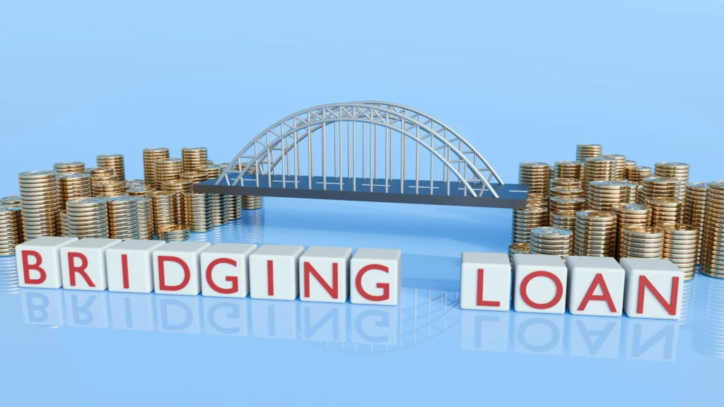Image showing a bridge with money at either end and blocks in front spelling out 'Bridging Loan'